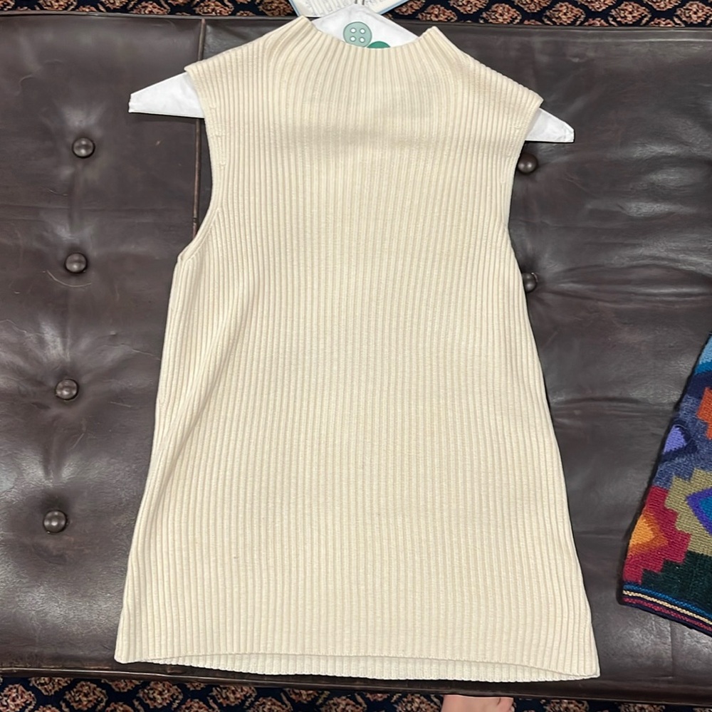 Cream silk sleeveless turtleneck